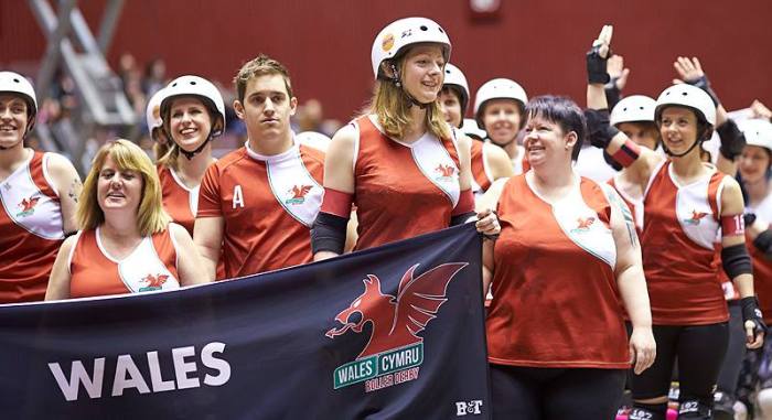 Professor Moriarty, at the left, walking out with Team Wales in Dallas. (Photo: Jason Ruffell, Roller-derby-on-film.)
